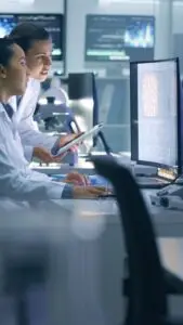 doctors looking at screen